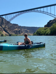Laura Root, LCSW and certified Nature Therapy Guide, kayaking on the Snake River in Boise, ID.